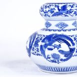 A Chinese blue and white porcelain vase, with phoenix design, height 21cm Perfect condition