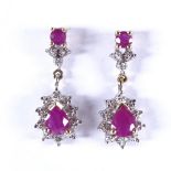 A pair of late 20th century 9ct gold ruby and diamond cluster drop earrings, earring height 19.