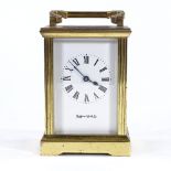 A Mappin & Webb brass cased 8-day carriage clock, case height 11cm, with outer travelling case