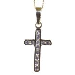 An 18ct gold diamond cross pendant necklace, on 18ct trace link chain, total diamond content