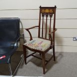 An English walnut Art Nouveau marquetry inlaid elbow chair, in the manner of Liberty & Co