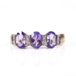 A modern 9ct gold amethyst and diamond half hoop dress ring, amethyst length 6.1mm, size P, 2.4g