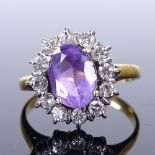 A late 20th century 18ct gold amethyst and diamond cluster ring, total diamond content approx 0.