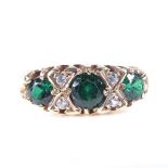 A late 20th century 9ct gold 7-stone green and white cubic zirconia half hoop ring, setting height