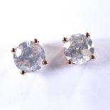 A pair of 14ct rose gold 1.8ct solitaire diamond earrings, with stud fittings, each diamond approx