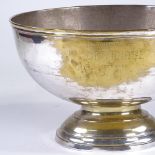 A silver plated Champagne bath, inscribed Champagne De Venoge Epernay, 36cm across, height 24.