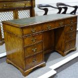 A Victorian walnut centre standing pedestal desk, green leather top with drawer fitted pedestals and