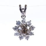 A 14ct white gold champagne and colourless diamond cluster flowerhead pendant, central stone