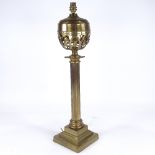 A brass oil lamp converted to electric, with fluted column, height excluding fitting 60cm