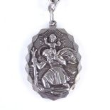 A heavy Art Deco silver Saint Christopher pendant, on early 20th century silver fancy link Albert