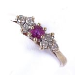 A late 20th century 9ct gold ruby and diamond dress ring, setting height 5mm, size P, 1.8g Very good