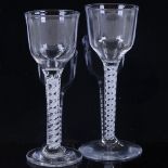 2 18th century cordial glasses with milk twist stems, height 15cm (2) Both perfect