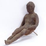 An Antique heavy cast-iron sculpture, seated man, unsigned, height 36cm (A/F)