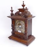 A 19th century German mahogany-cased architectural 8-day mantel clock, silvered brass dial with