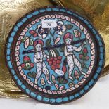 An Islamic enamelled copper tray, and 2 Islamic brass trays, largest diameter 34cm (3)