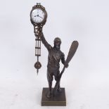 A bronze Mystery clock in the form of a First War Period pilot holding an aircraft propeller, with