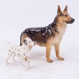 A Royal Doulton HN1116 Alsatian, and a Beswick Dalmatian, largest height 15.5cm (2)