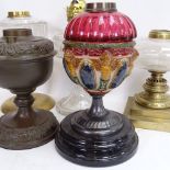 A large collection of various oil lamp parts and spares, including shades, bases and chimneys (3