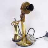 A Vintage brass candlestick dial telephone, height 31cm