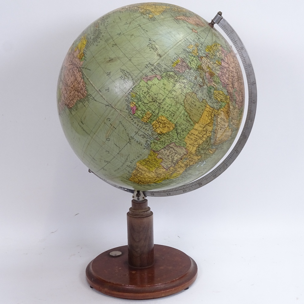 An early 20th century terrestrial globe, by James Wellsworth Ltd, on compass inset stand, overall