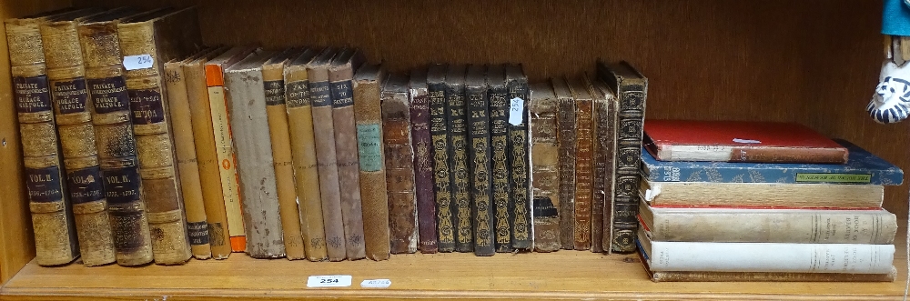 A shelf of books, including private correspondence of Horace Walpole, 4 volumes leather-bound