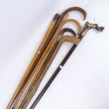 A group of walking sticks, including a silver-topped cane with Royal Fusiliers crest