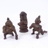 An Indian patinated bronze figure of Ganesh, height 8cm, and 2 bronze kneeling Buddha figures (3)