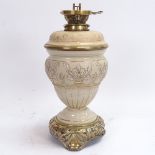 A 19th century Hinks & Sons brass-mounted stoneware oil lamp, height 37cm