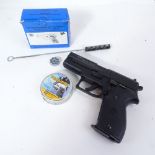 A RWS air pistol, cased with pellets