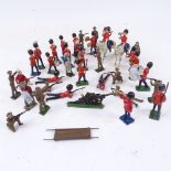 A collection of Vintage painted metal soldiers, cowboys, guardsmen etc, some with impressed marks