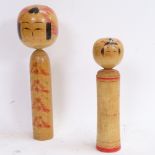 2 Oriental turned and stained wood Kokeshi dolls, largest height 24cm (2)