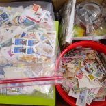 A large quantity of various loose world postage stamps (boxful)