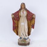 A painted plaster figure of Jesus, 33cm