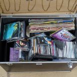 A quantity of CDs and cassettes