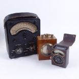 A leather-cased Avo Meter, an Avo Exposure Meter, and a mahogany-cased meter (3)