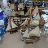 A painted wood model of the Golden Hind, height 44cm, and 5 other models of sailing ships and boats