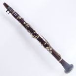 A Vintage rosewood 4-section clarinet, unmarked, overall length 57cm