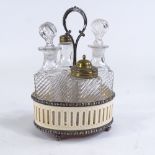 An unusual Victorian ivory and silver plate cruet stand, containing 4 pressed glass cruet bottles