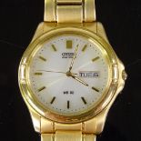 CITIZEN - a gold plated stainless steel Eco-Drive WR50 quartz wristwatch, ref. E101-8034957,