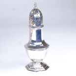 A late Victorian silver baluster sugar caster, octagonal form with pierced lid, by Goldsmiths &