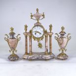 A French Empire style veined pink marble and brass-mounted 8-day 3-piece clock garniture, by