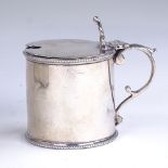 A Victorian silver mustard pot, beaded border with scrolled C acanthus leaf handle and shell