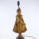 A carved giltwood standing Buddha figural table lamp, height to top of head 49cm, PAT tested