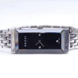 GUCCI - a lady's stainless steel G-Frame quartz wristwatch, ref. 127.5, circa 2001, black dial