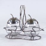 An electroplate and glass preserve set, in the form of 2 apples, length 21cm