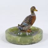 An onyx dish surmounted by a cold painted bronze duck, diameter 12cm