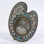 A 19th century micro-mosaic artist's palette-shaped photo frame, with raised floral decoration,