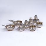 A set of 19th century Russian 84 Zolotnik standard silver cruets, comprising 4 squat pepperettes and