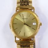 TISSOT - a Vintage gold plated stainless steel quartz wristwatch, ref. C282K, champagne dial with