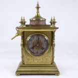 A late 19th/early 20th century French gilt-bronze 8-day mantel clock, by T R Russell of Paris,